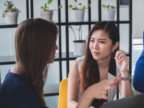 business woman in yellow chair how to fire a client