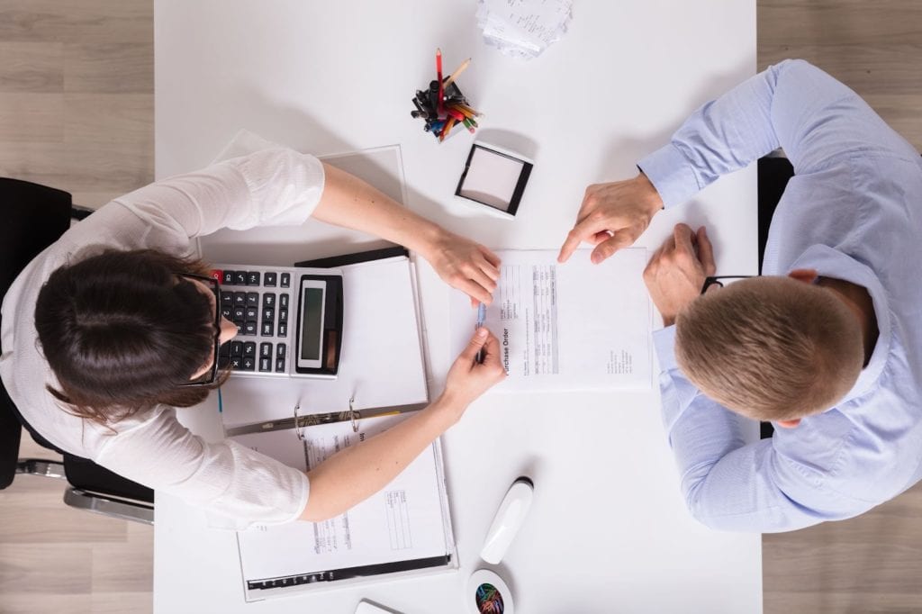 Reviewing financials accountant with new client