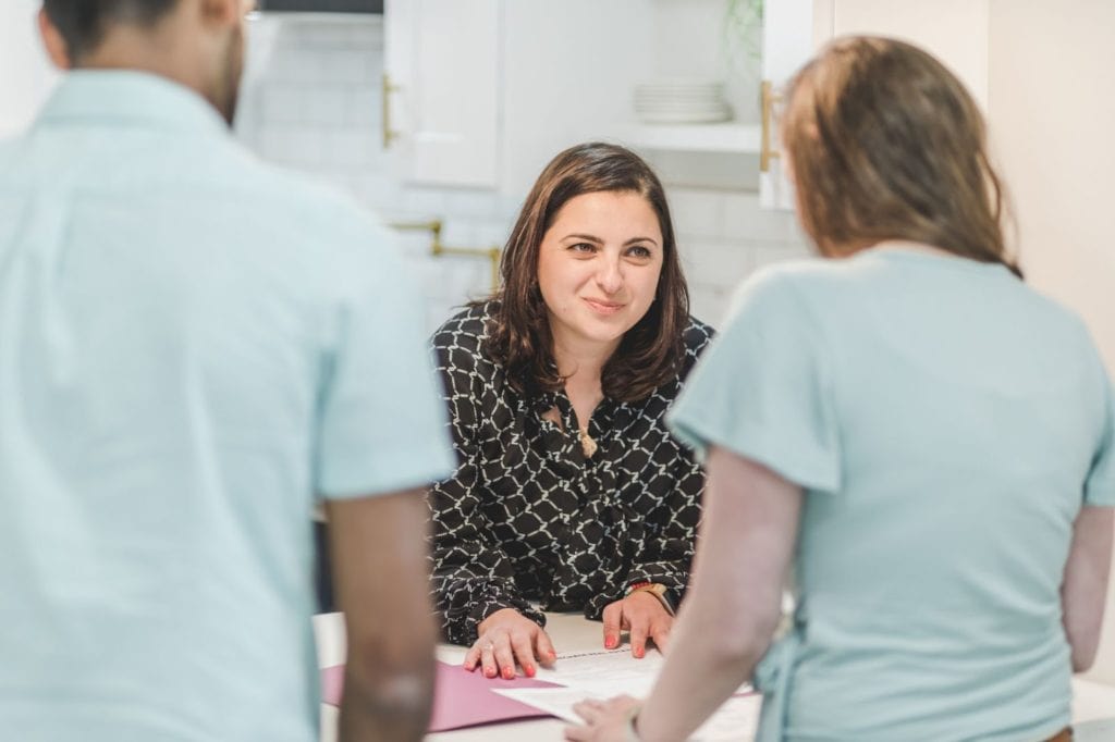 woman speaking to clients