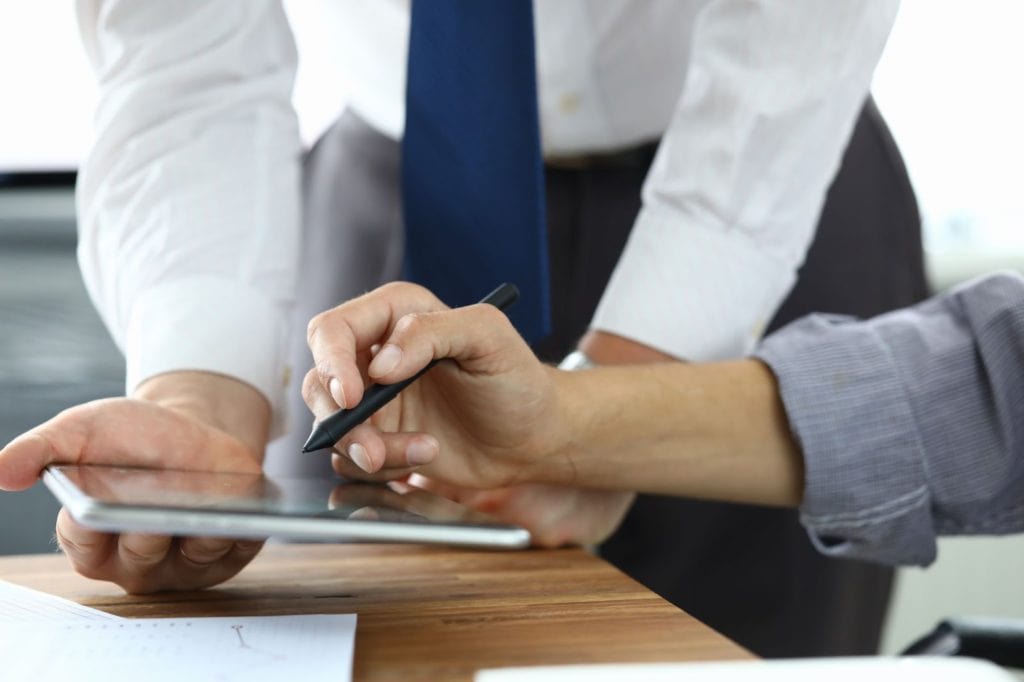 Signing agreement checking off list items