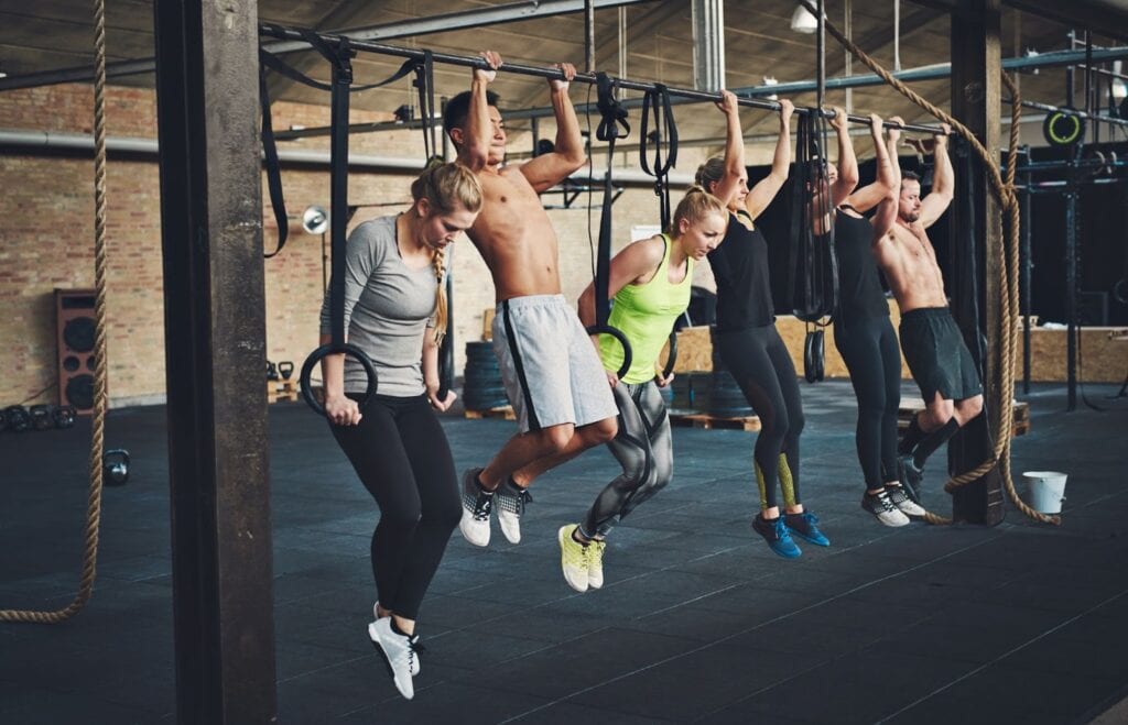 Group of people working out at gym together