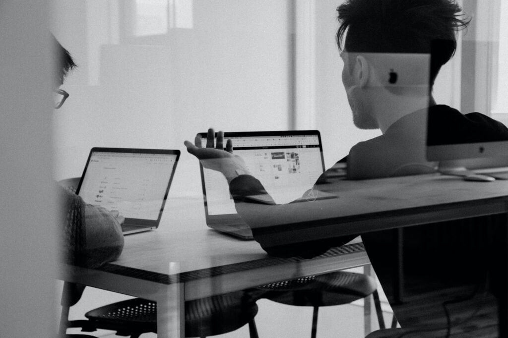 man speaking to an investor